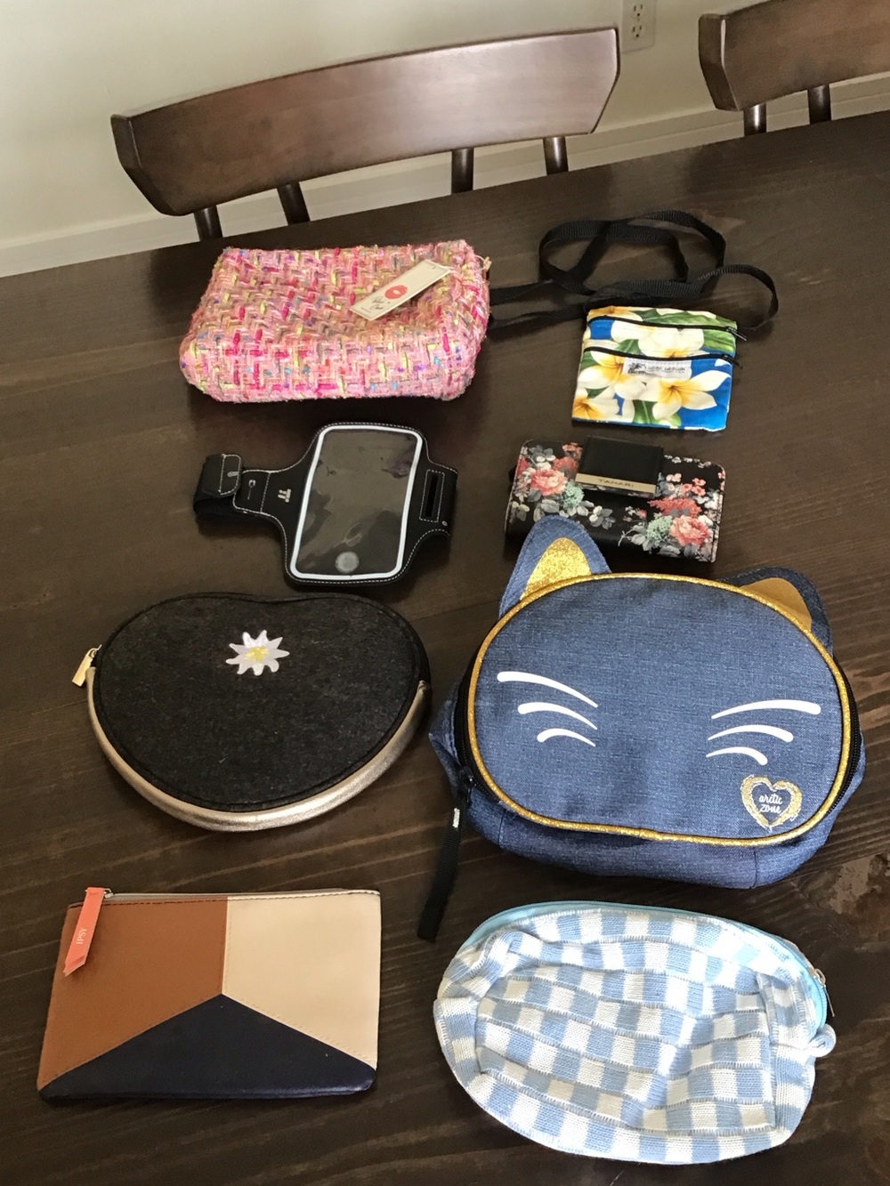 Lot of travel, storage, wristlet, makeup, lunch bag, wallet. +